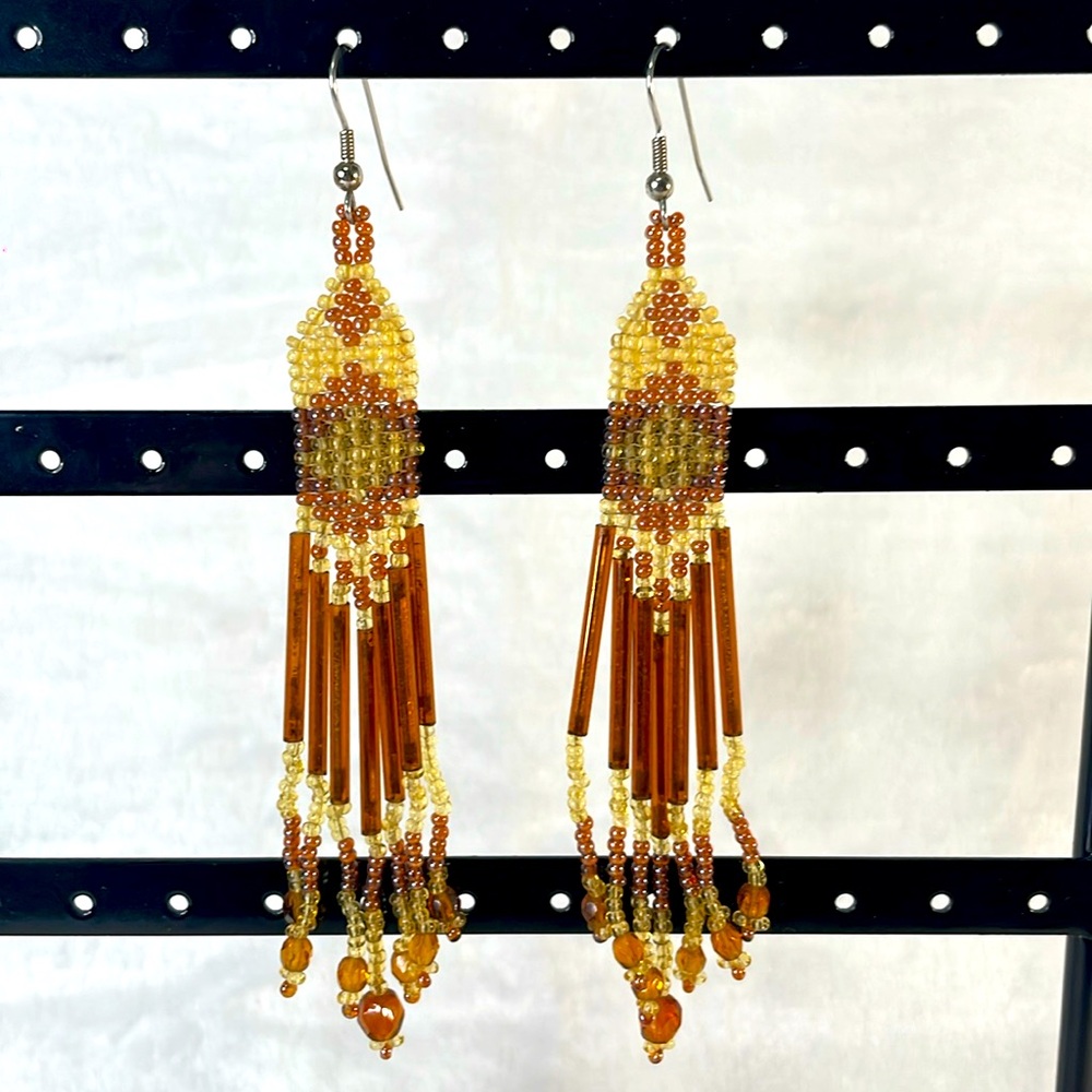 Handmade dangle yellow and brown glass beaded earrings. Light weight. 4” long.